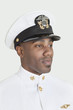 Young African American US Navy officer over gray background