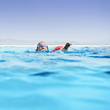 Boy in infinity pool