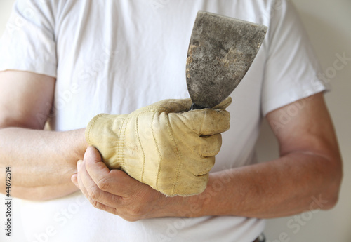 Photo: man working with a painful wrist man working with a painful wrist