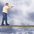Man balancing on the high wire