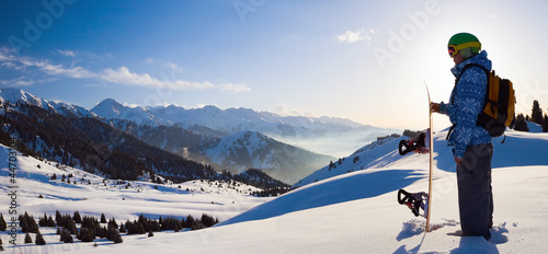 Photo: Sport woman in snowy mountains Sport woman in snowy mountains