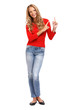 smiling blond woman pointing her finger towards copyspace