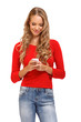 cute young blond woman reading an SMS on mobile
