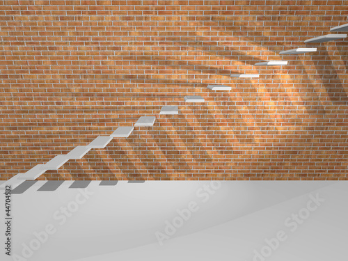 Photo: Concrete steps are on a brick wall. Concrete steps are on a brick wall.