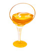 Photo: honey flow dropping from glass cup isolated on white honey flow dropping from glass cup isolated on white