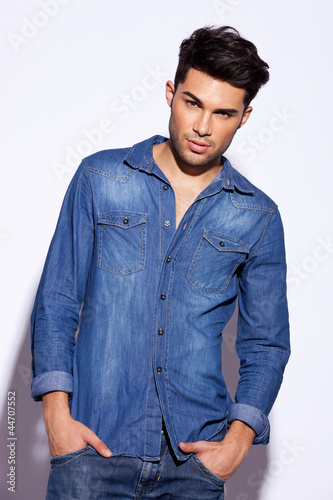 Photo: handsome casual man in a jeans shirt handsome casual man in a jeans shirt