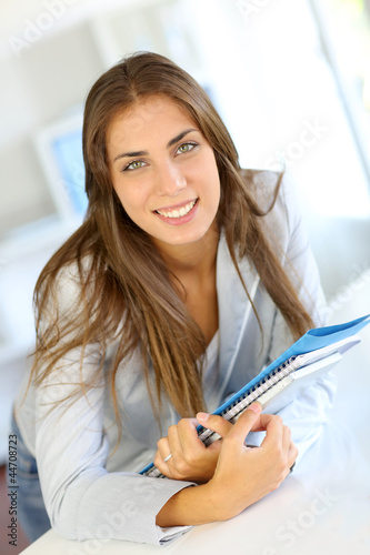 Photo: Portrait of beautiful university girl Portrait of beautiful university girl