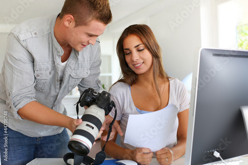 Photo: Student in photography working together on project Student in photography working together on project