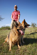 Mann mit Hunden