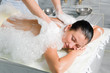 Soap sud massage from above at Turkish bath