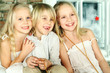 Photo: Christmas children - cheerful smiling kids Christmas children - cheerful smiling kids