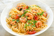 Foto: Spaghetti con gamberetti, pomodoro e prezzemolo Spaghetti con gamberetti, pomodoro e prezzemolo