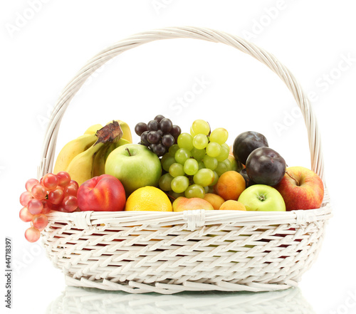 Foto: Assortment of exotic fruits in basket isolated on white Assortment of exotic fruits in basket isolated on white