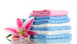 towels with beautiful pink lily, isolated on white