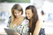 happy friends with digital tablet