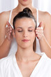 Woman Receiving a Head Massage