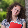 Young Beautiful Female Student at Park