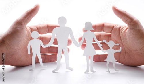 Photo: Cardboard figures of the family on a white background. Cardboard figures of the family on a white background.