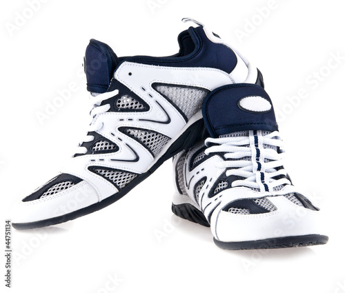 Photo: sporting shoe on a white background sporting shoe on a white background