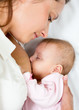close-up portrait of suckling baby infant