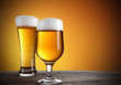 Photo: Beer glasses with gold background Beer glasses with gold background