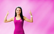 Photo: Young woman cancer survivor on soft pink Young woman cancer survivor on soft pink
