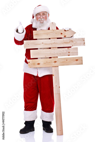 Photo: Santa with wooden sign Santa with wooden sign