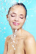 Beautiful girl and stream of water
