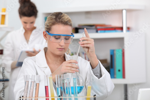 Photo: Two students in science class Two students in science class