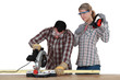 Carpenter with chainsaw