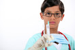 Boy dressed as doctor