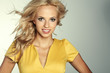 woman with beautiful blond hairs and multicolor makeup isolated