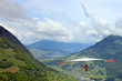 Hang glider pilot in Swiss Alps