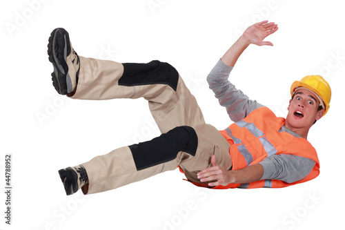 Photo: Construction worker falling over Construction worker falling over