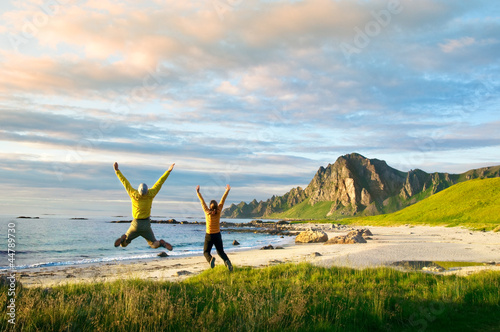 Photo: couple jumping couple jumping