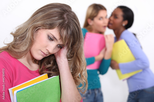 Photo: Girl being bullied at school Girl being bullied at school