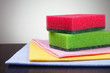 colorful washing tools over grey background
