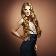 Portrait of beautiful woman with red hair in evening dress