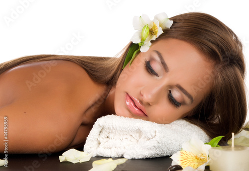 Foto: female during luxurious procedure of massage female during luxurious procedure of massage