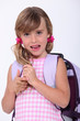 Young schoolgirl with a rucksack