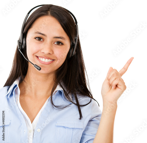Photo: Woman with headset pointing Woman with headset pointing