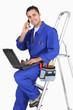 Electrician chatting to customer on the phone