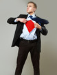 Superhero businessman, isolated on grey backgroound