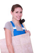 craftswoman carrying tiles