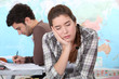 A woman sleeping in class