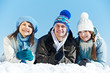group of happy young people in winter