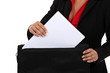 Lawyer pulling a document out of her briefcase