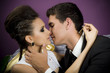 The man tries to kiss the girl of the punk