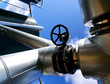Industrial zone, Steel pipelines and valves against blue sky