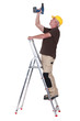 Handyman drilling the ceiling